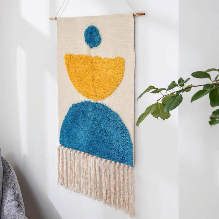 Hand-woven tassel tapestries decorate hanging cloth